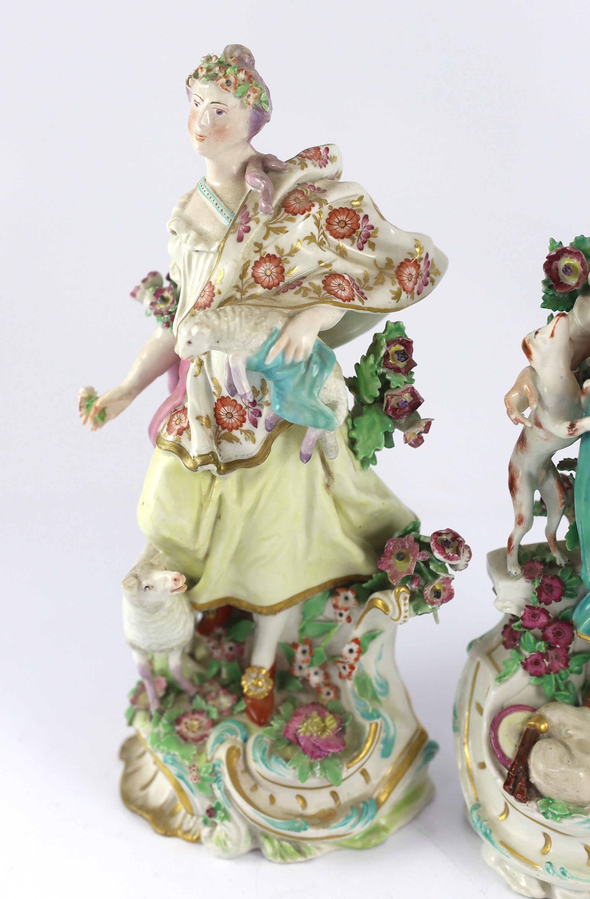 NB shepherdess head restored. A pair of Chelsea porcelain groups of a shepherd and shepherdess , c.1760-65